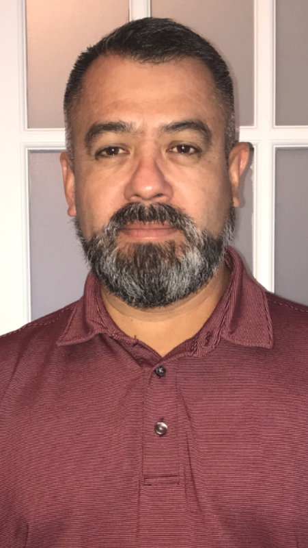 Professional headshot of Mr. Marcos Munozramos