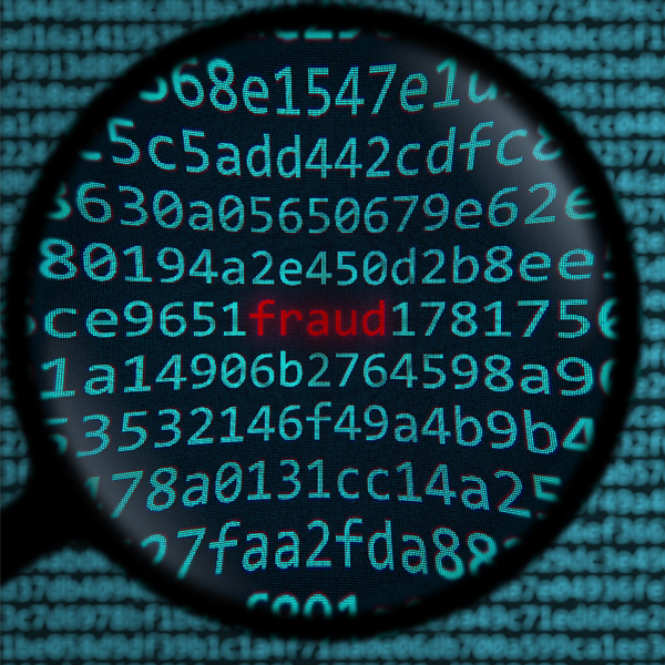 A magnifying glass searches through data code. In the center is the word fraud. The word fraud is highlighted in red to show importance.