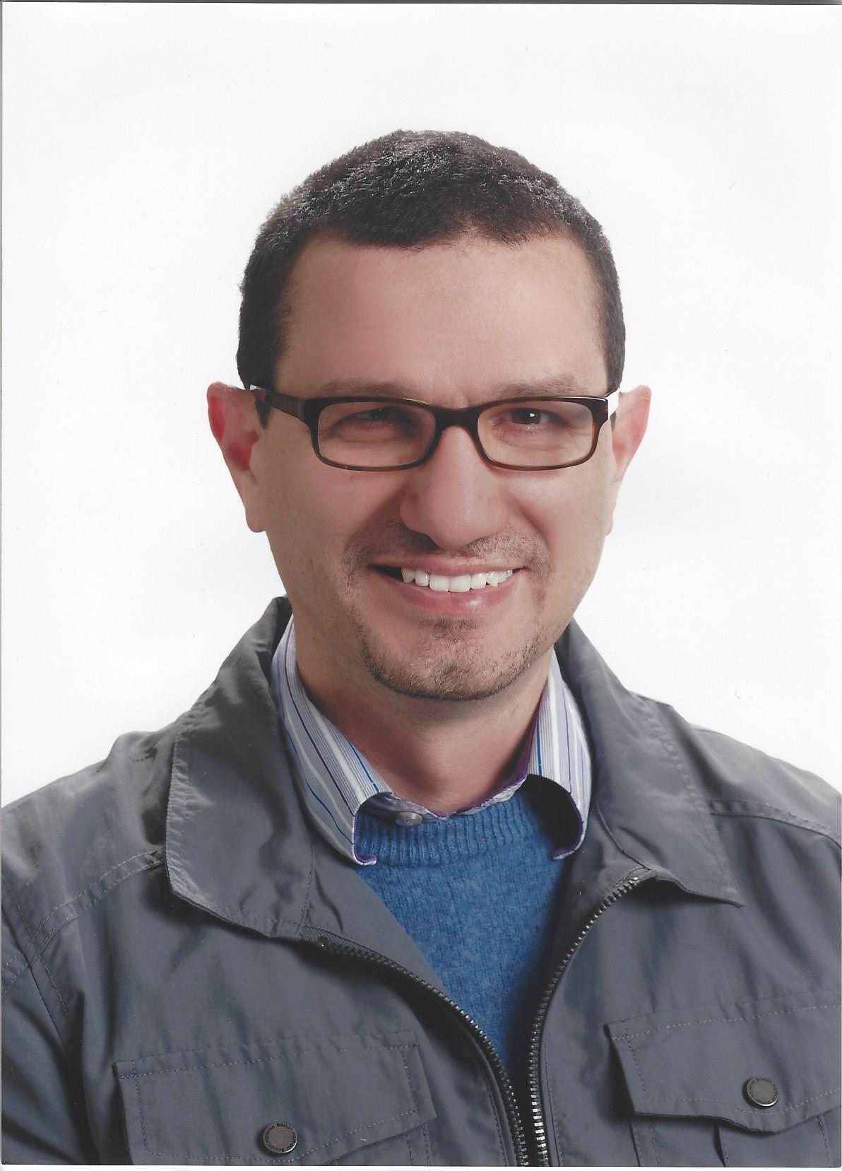 Dr. Issam El Naqa headshot