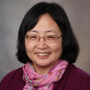 Headshot of Dr. Hongfang Liu, woman with dark hair and glasses smiling at camera