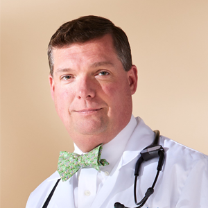 Professional headshot of Douglas Flora, M.D., LSSBB