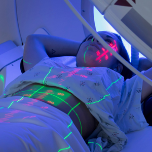 Person receiving radiation therapy treatment