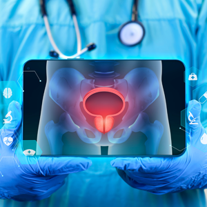 Doctor holds laptop showing a high-tech image of a prostate in red. Small icons are in the background showing all the ways that technology can help in improving healthcare. Those icons show medications, health care, diagnoses, treatment, genetics, and more. 