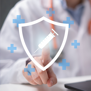 Clinician sits behind a laptop. Above the laptop is the emblem of a shield, surrounded by blue crosses. A syringe is superimposed on the shield and the doctor is pressing the emblem with his finger. Denotes how AI is helping doctors select treatment for their patients.