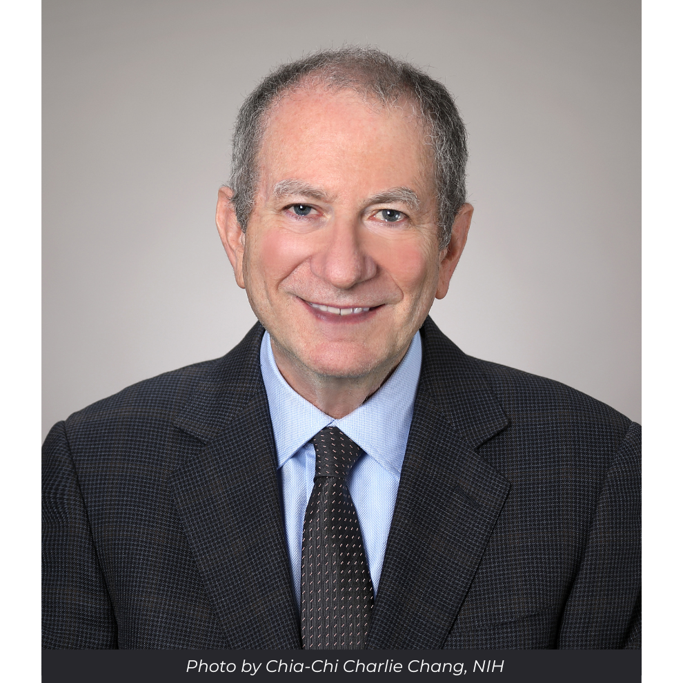 Professional headshot of Dr. Eric Rocky Feuer. Text reads, "Photo by Chia-Chi Charlie Chang, NIH"